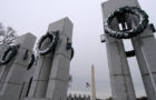 Washington, D.C. (Mar. 8, 2005) – The Washington Monument is framed between pillars adorned with oak and wheat bronze wreaths at the National World War II Memorial located on the National Mall in Washington, D.C. A 17-foot pillar and bronze wreath represents each State and U.S. territory from the time period. Established by the American Battle Monuments Commission, the memorial honors all military veterans of World War II, the citizens on the home front, the nation at large, and the high moral purpose and idealism that motivated the nation’s call to arms. The memorial was officially dedicated on May 29, 2004. U.S. Navy photo by Photographer’s Mate 2nd Class Daniel J. McLain (RELEASED)