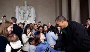 "After the President and Congress finally agreed on a bill to keep the government from shutting down, the President decided to make an unannounced stop to thank tourists for visiting the Lincoln Memorial the following day. The Memorial and other monuments and national parks in Washington and across the country would have been forced to close had they not come to an agreement. Here, the President greets a surprised young girl as other tourists in the background snap pictures of their chance encounter with the President." (Official White House Photo by Pete Souza)
