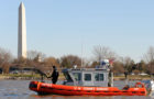 U.S. Coast Guard Petty Officer 2nd Class John Cantu, with the Coast Guard Maritime Safety and Security Team (MSST) based in Galveston, Texas, mans a mounted machine gun on a 25-foot Response Boat-Small in front of the Washington Monument in Washington, Jan. 19, 2013. The MSST and other Coast Guard units throughout the United States deployed to Washington to provide security for the 57th Presidential Inauguration. President Barack H. Obama was elected to a second four-year term in office Nov. 6, 2012. More than 5,000 U.S. Service members participated in or supported the inauguration. (DoD photo by Petty Officer 3rd Class Lisa Ferdinando, U.S. Coast Guard/Released)