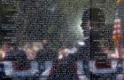President Barack Obama is reflected in the Vietnam Veterans Memorial wall as he delivers remarks during the 50th Anniversary of the Vietnam War commemoration ceremony in Washington, D.C., May 28, 2012. (Official White House Photo by Pete Souza)