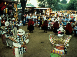 Taquile musicians from Peru perform in the "Land in Native American Cultures" program at the 1991 Festival of American Folklife held on the National Mall, Washington, D.C. (Smithsonian Photo)