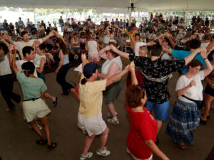 Visitors try Scottish ceilidh dancing at the 2003 Smithsonian Folklife Festival on the National Mall. (Richard Strauss/Smithsonian)