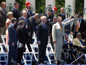 Former U.S. Presidents Bill Clinton and George H.W. Bush at the World War II Memorial dedication ceremony in Washington D.C. Photo credit: Don Ripper (Latoff Inc.) / American Battle Monuments Commission from the National World War II Memorial website (https://www.wwiimemorial.com).