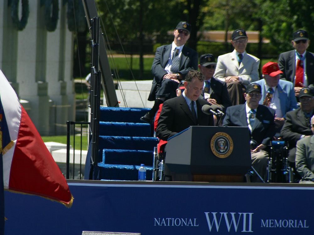 Actor Tom Hanks at the World War II Memorial dedication in Washington D.C. Photo credit: Don Ripper (Latoff Inc.) / American Battle Monuments Commission from the National World War II Memorial website (https://www.wwiimemorial.com).