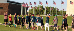 Sports and exercising on the National Mall featuring members of DC Fray in action. Outdoor leagues include flag football, softball, volleyball, bicycling, soccer and yoga. (Photographs courtesy of DC Fray)