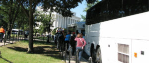 Buses parking along the National Mall.